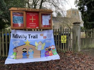 Parish notice board with large poster