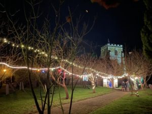 outside view of a church with Christmas lights